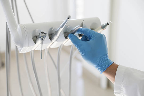 Professional Root Canal Treatment technician working in Dundee, FL